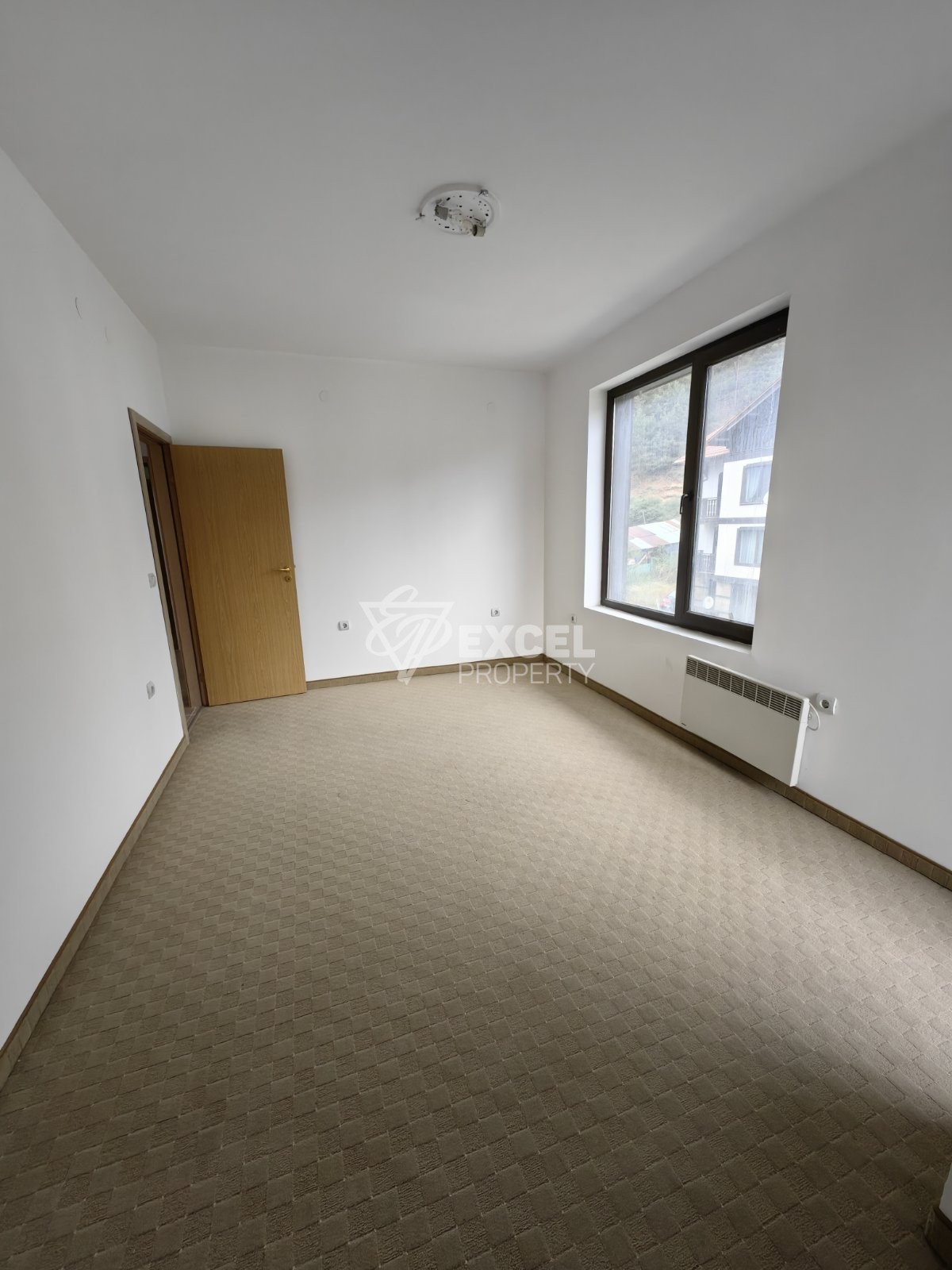 Двустаен апартамент с южно изложение и просторна тераса в целогодишен комплекс 3 Планини