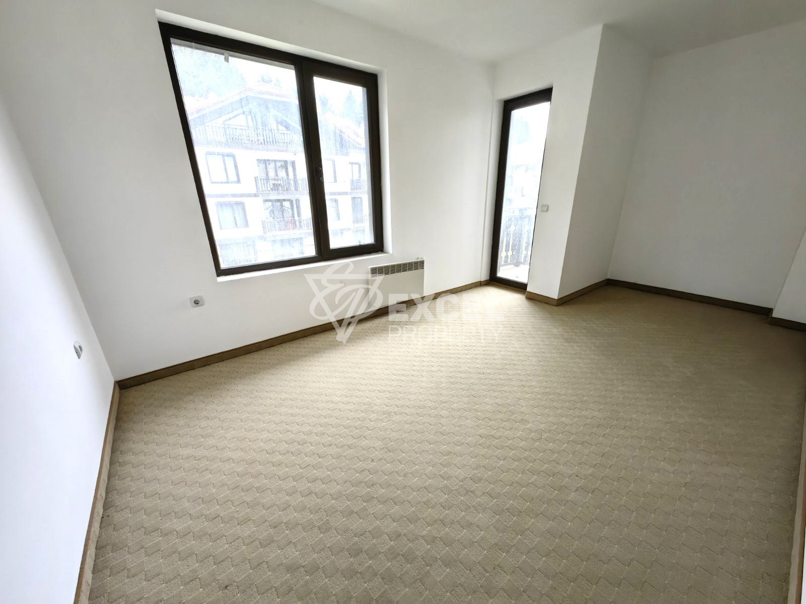 Двустаен апартамент с южно изложение и просторна тераса в целогодишен комплекс 3 Планини