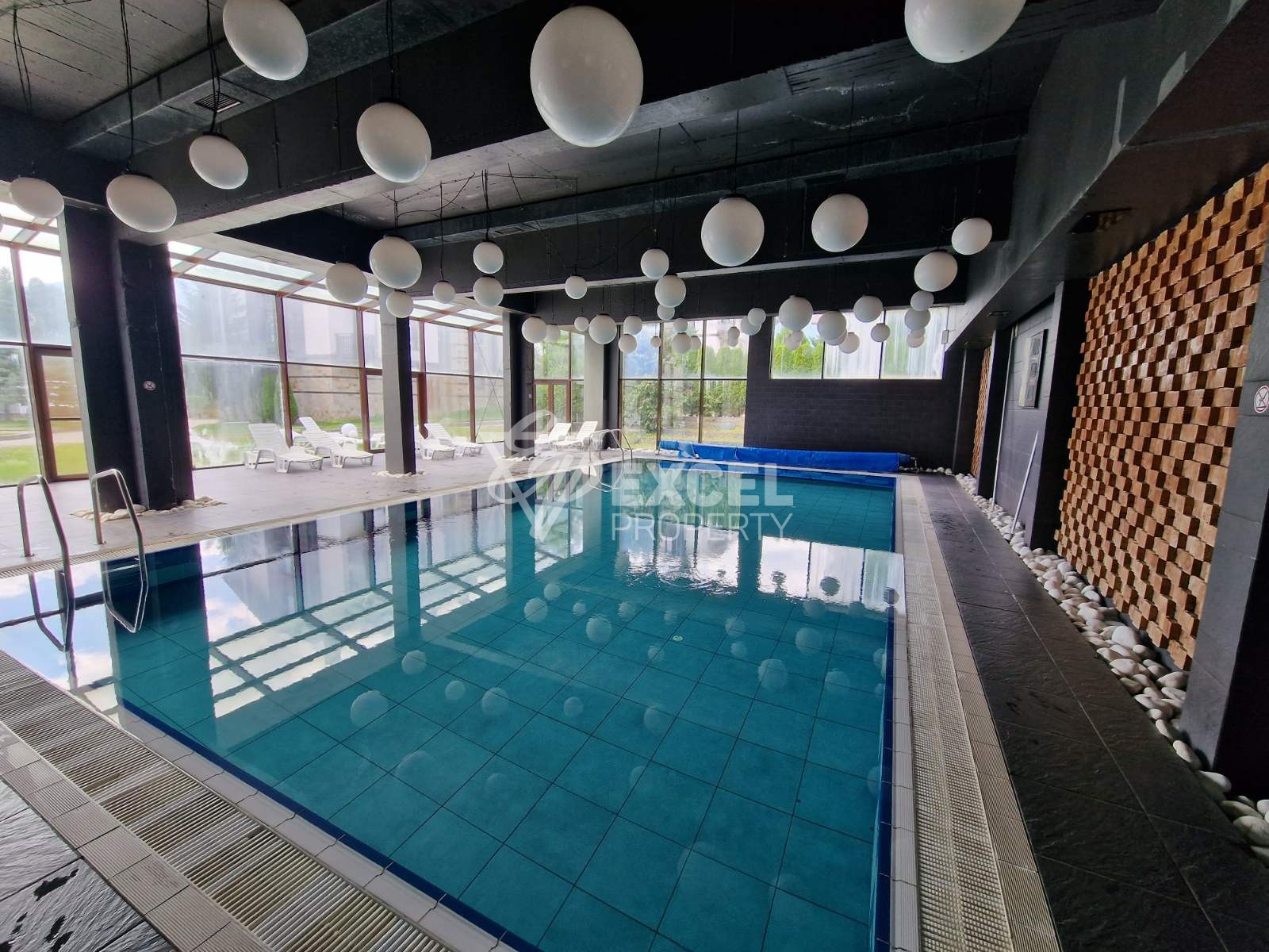 Прекрасен двустаен апартамент за продажба в целогодишен комплекс с ниска такса поддръжка, до Разлог