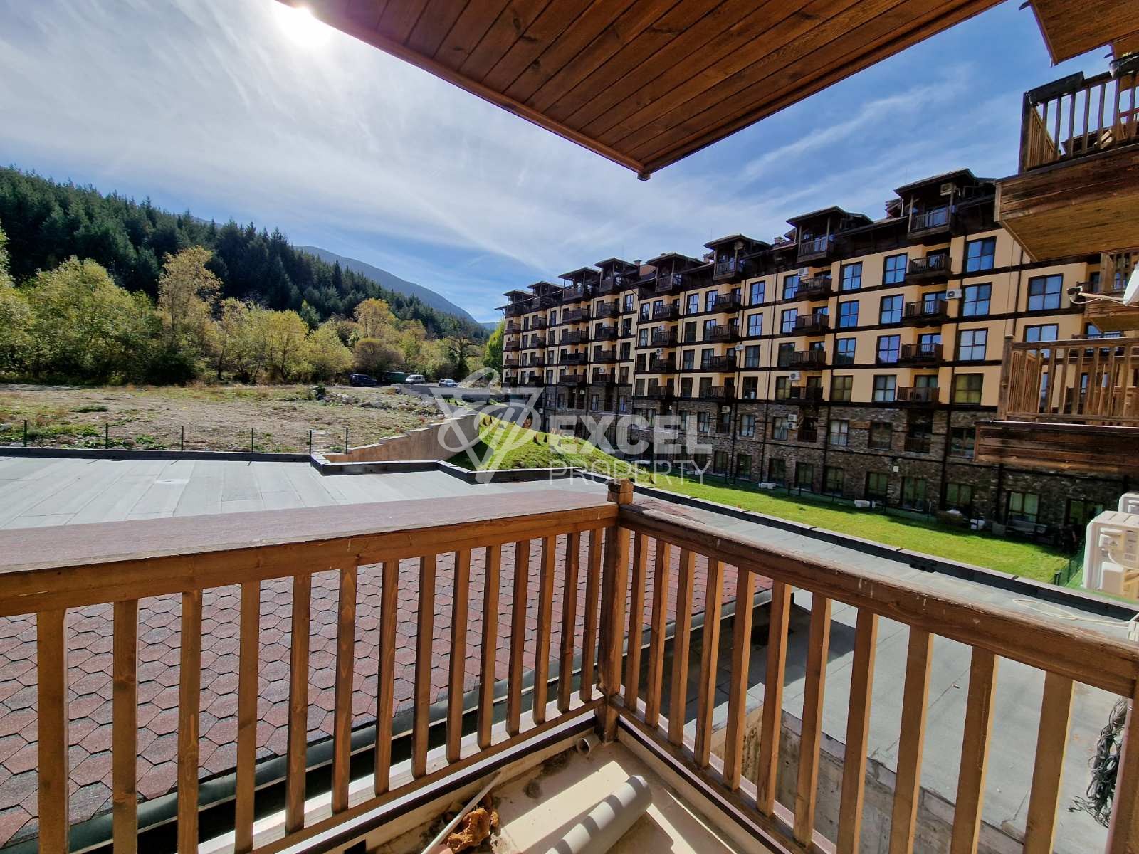 Просторно южно студио за продажба в жилищна сграда с ниска такса поддръжка, Банско