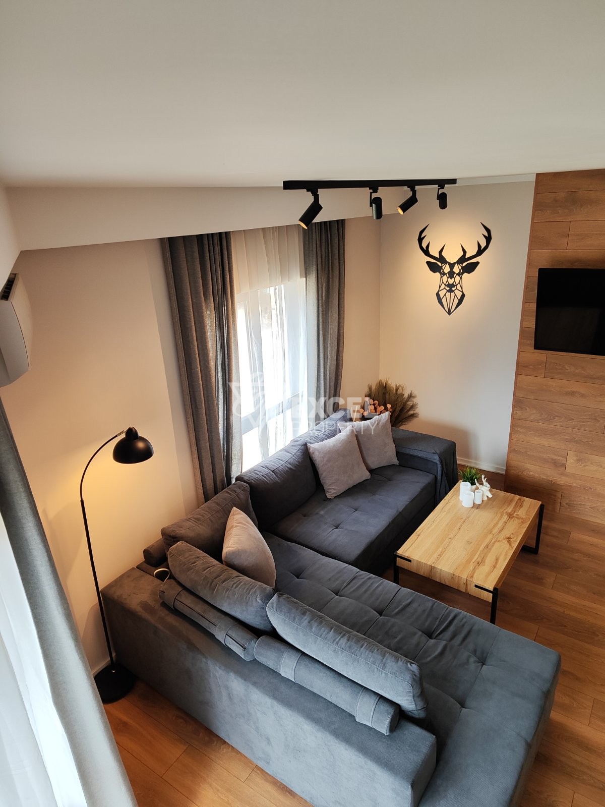 Елегантно обзаведен тристаен апартамент с ниска такса поддръжка