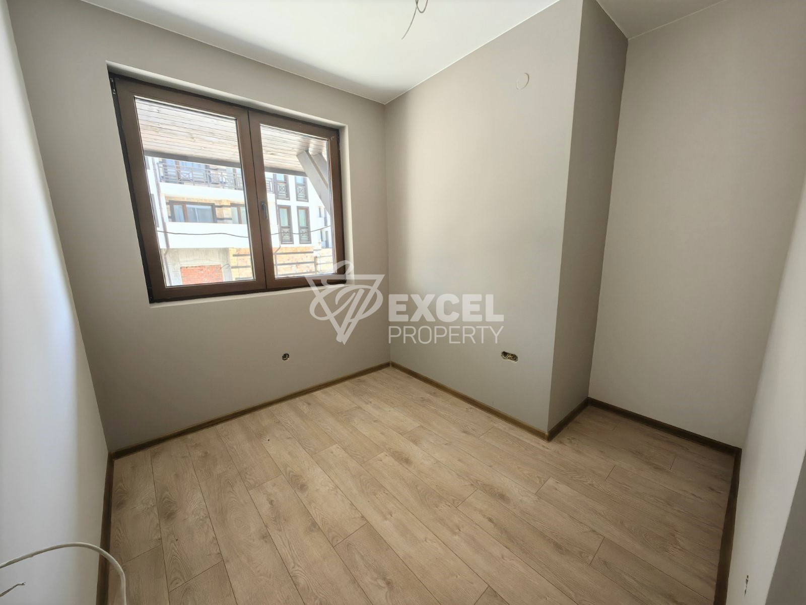 Тристаен апартамент за продажба в нова жилищна сграда, Банско