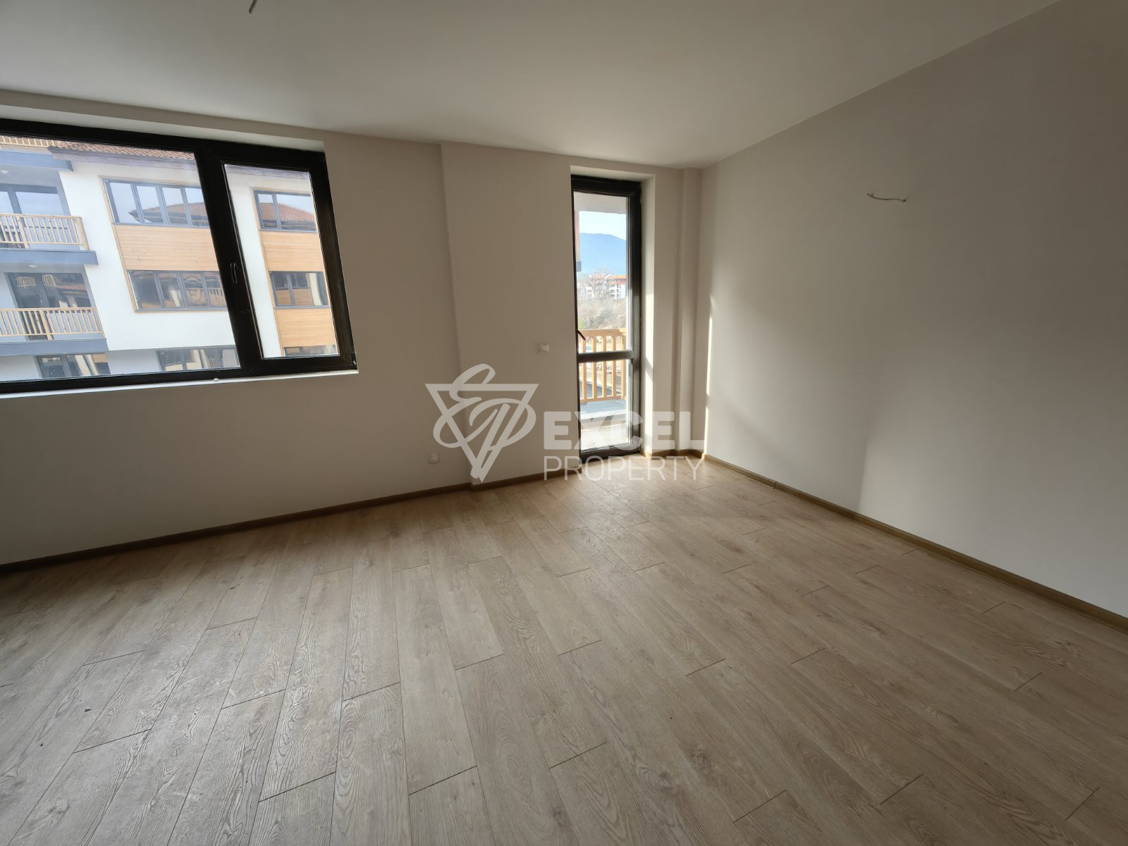 Южно студио с тераса в нова жилищна сграда с ниска такса поддръжка, Банско