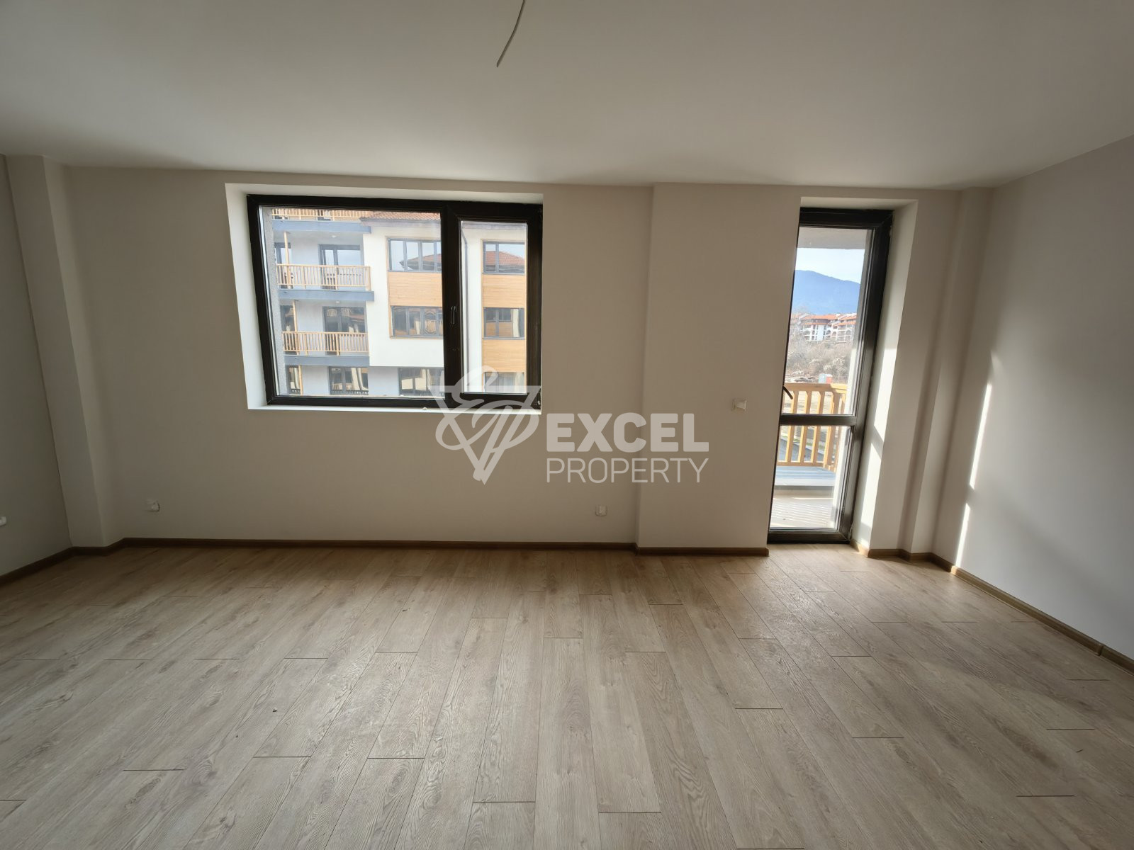 Южно студио с тераса в нова жилищна сграда с ниска такса поддръжка, Банско