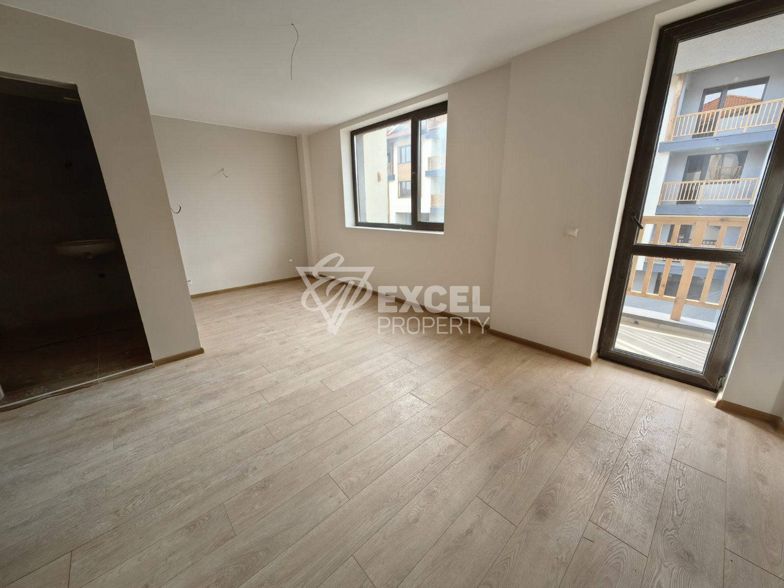 Южно студио с тераса в нова жилищна сграда с ниска такса поддръжка, Банско