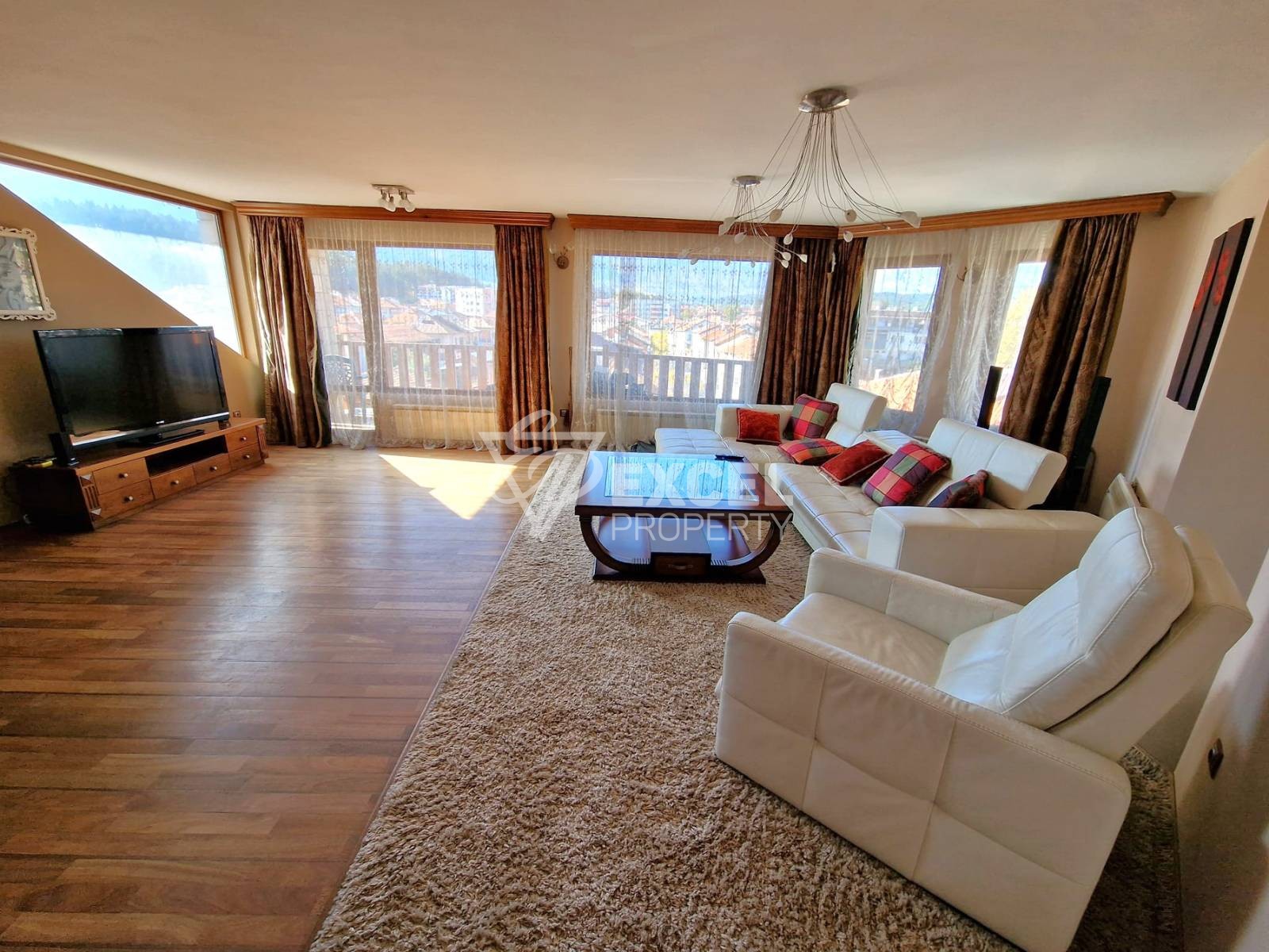 Дизайнерски многостаен апартамент в иделния център на Разлог