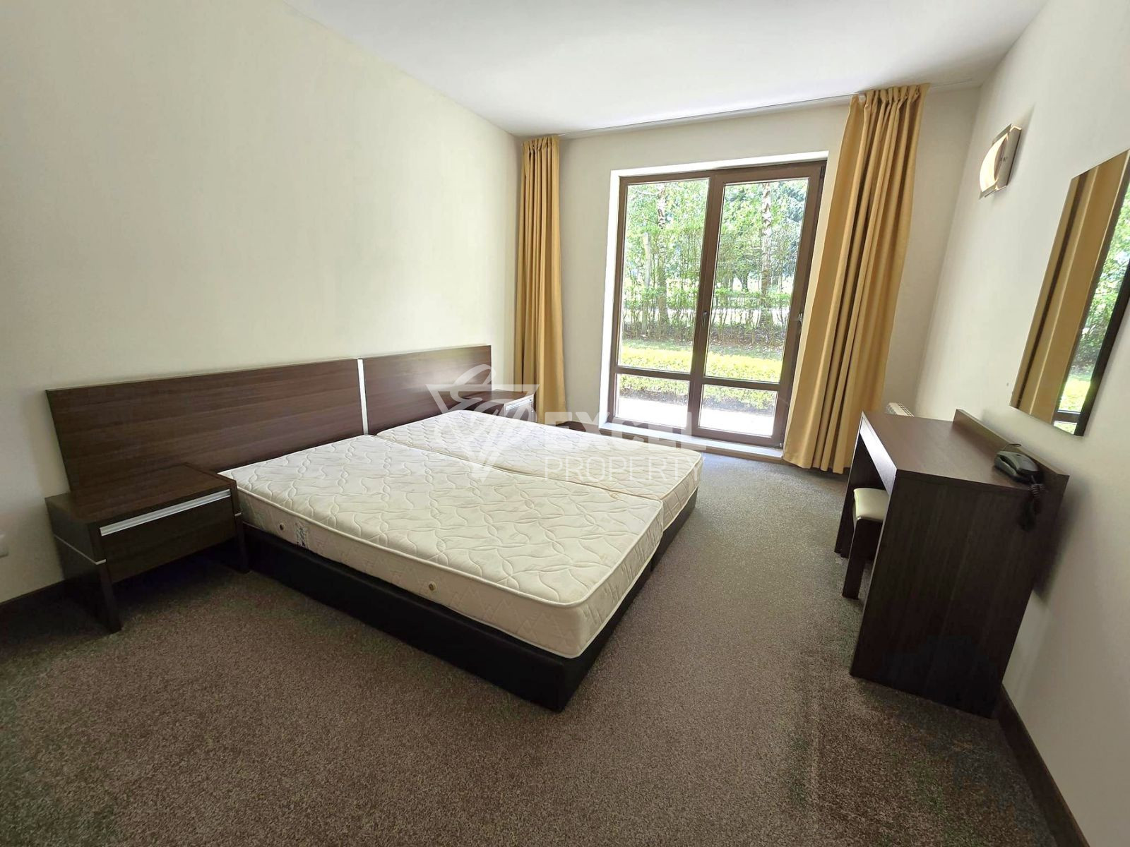 Южен тристаен апартамент на партерно ниво за продажба в комплекс Тера до Пирин Голф