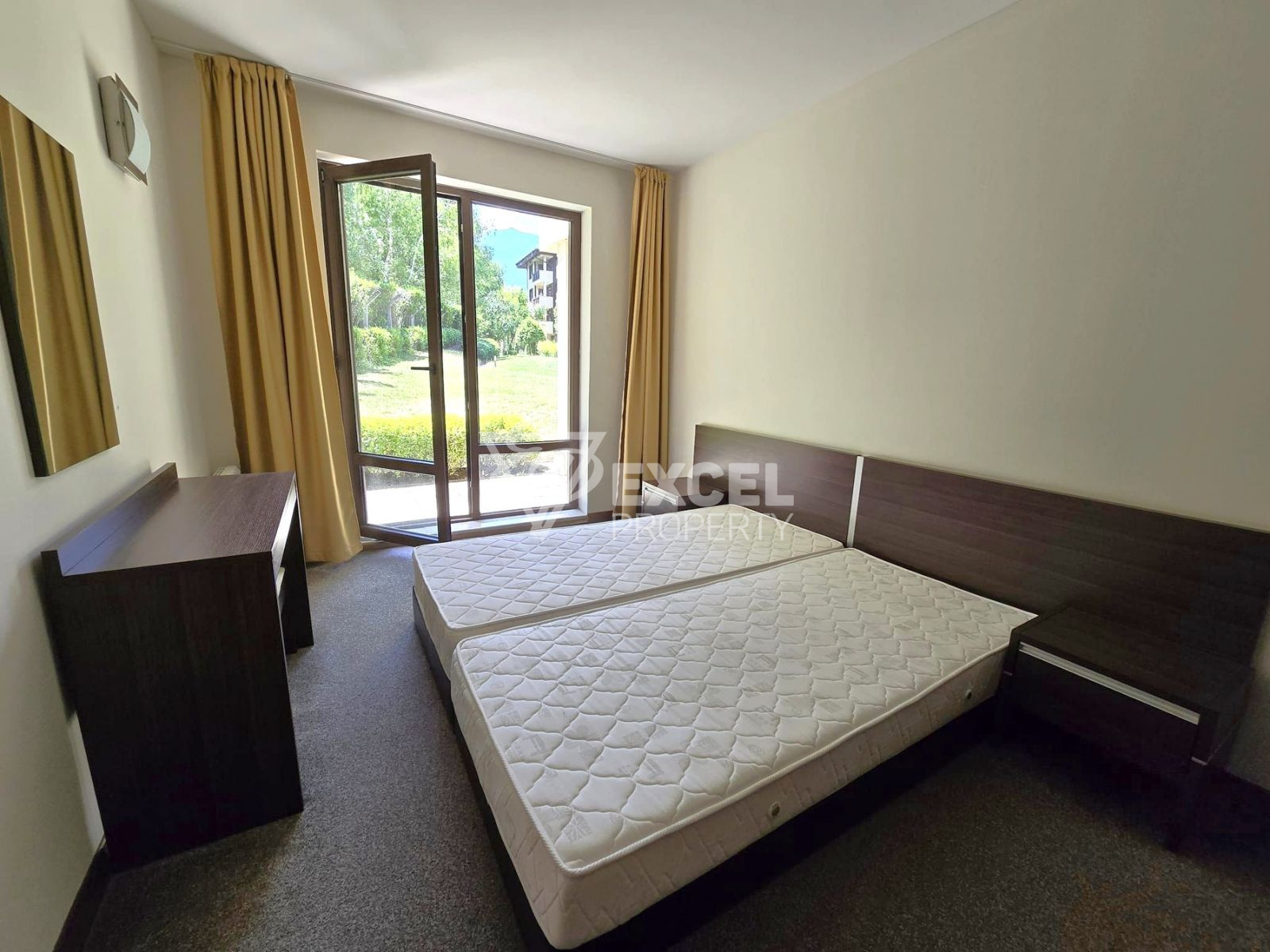 Южен тристаен апартамент на партерно ниво за продажба в комплекс Тера до Пирин Голф