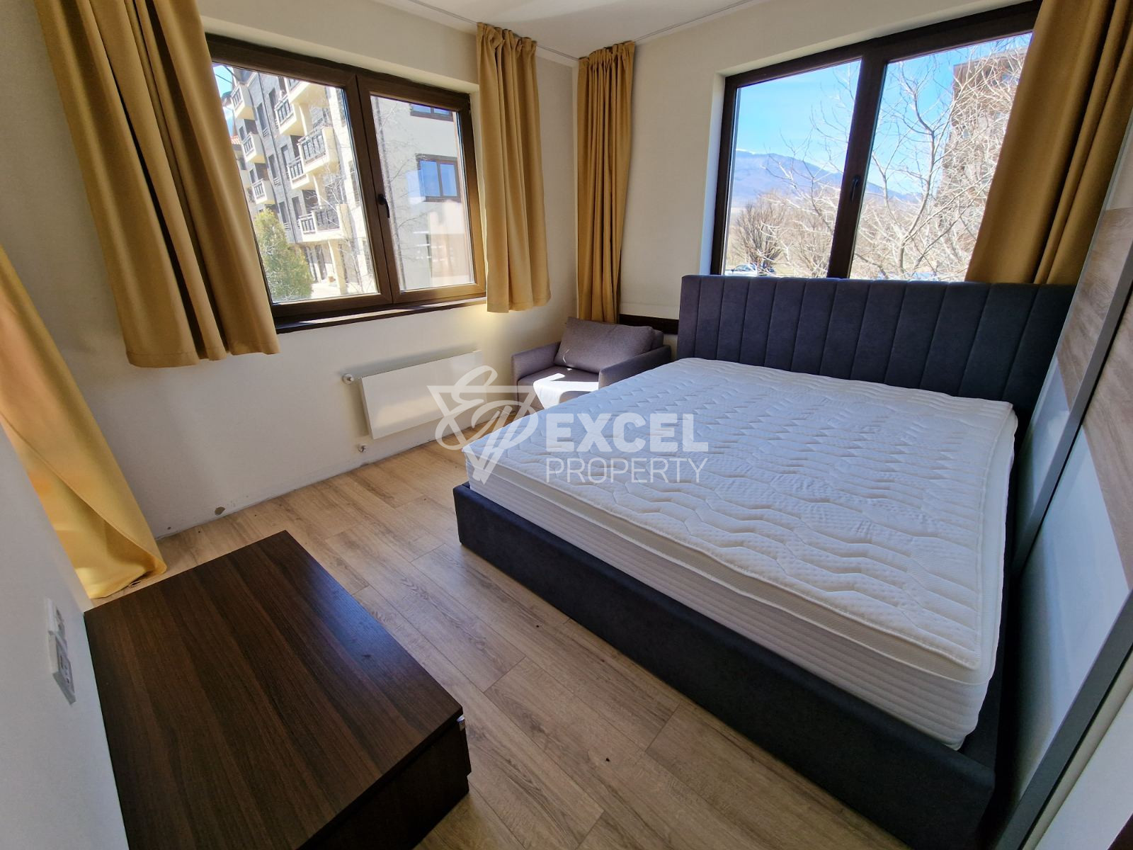 Просторен двустаен апартамент за продажба с изглед към Пирин планина и голф игрище