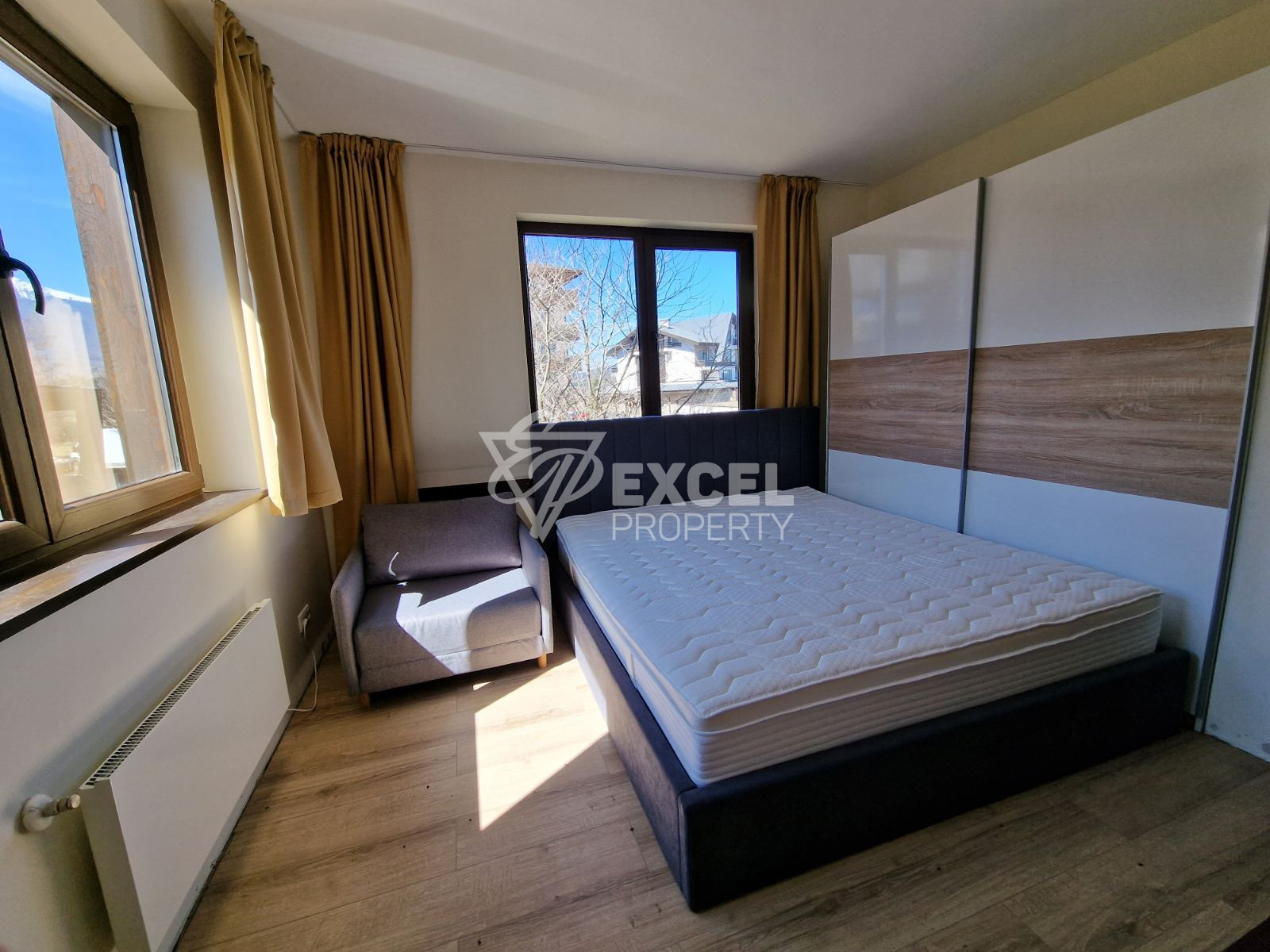 Просторен двустаен апартамент за продажба с изглед към Пирин планина и голф игрище