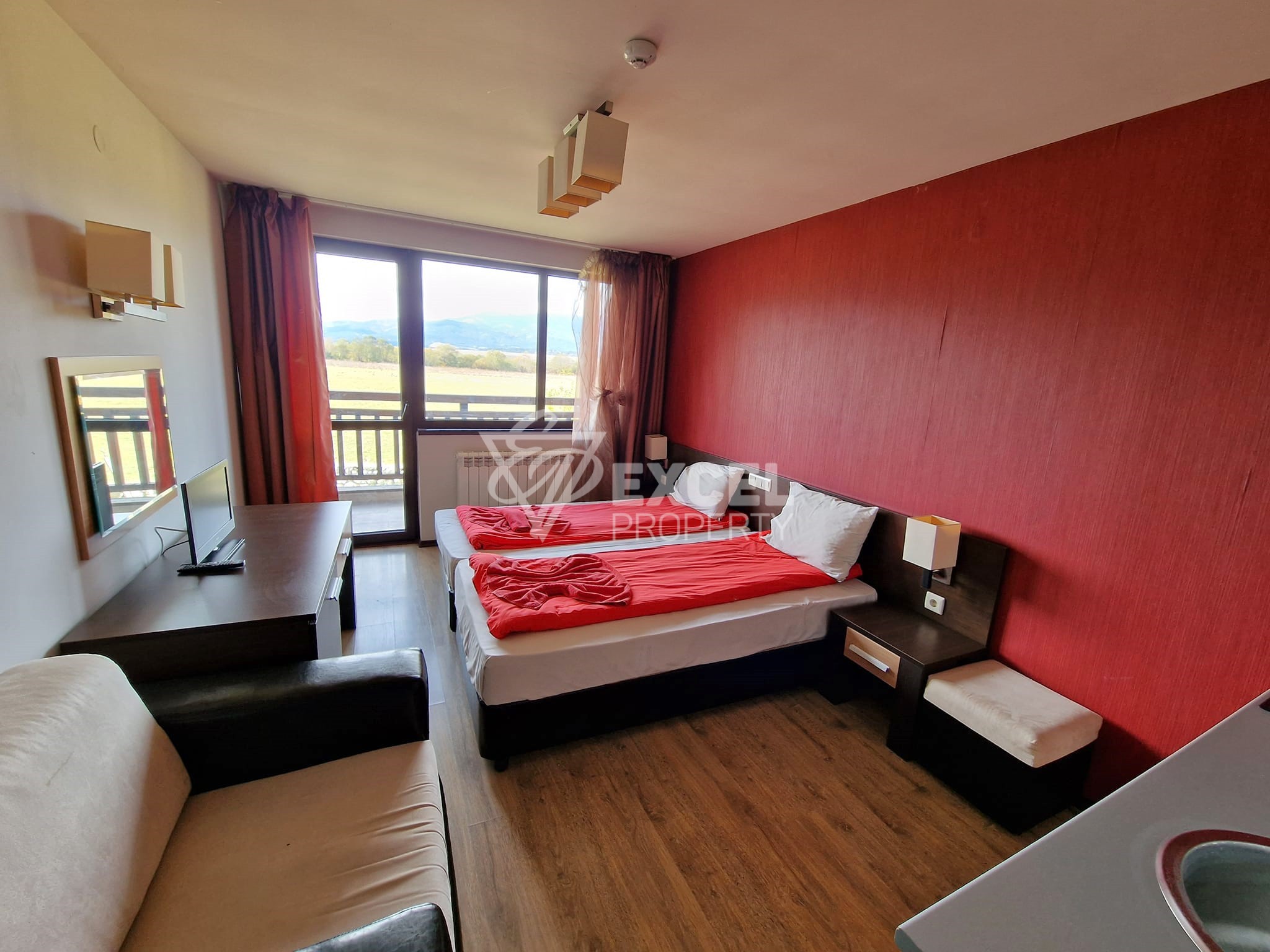 Студио с красива гледка към Пирин за продажба между Банско и Баня! Ниска такса поддръжка!