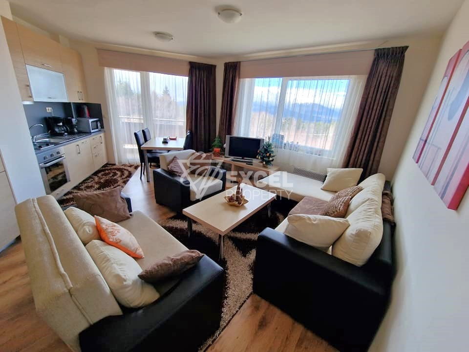 Двустаен апартамент с подземно паркомясто и ниска такса поддръжка за продажба в Банско