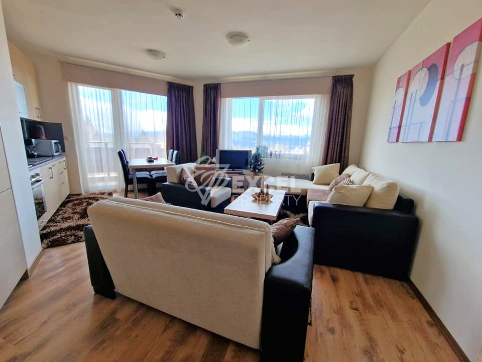 Двустаен апартамент с подземно паркомясто и ниска такса поддръжка за продажба в Банско