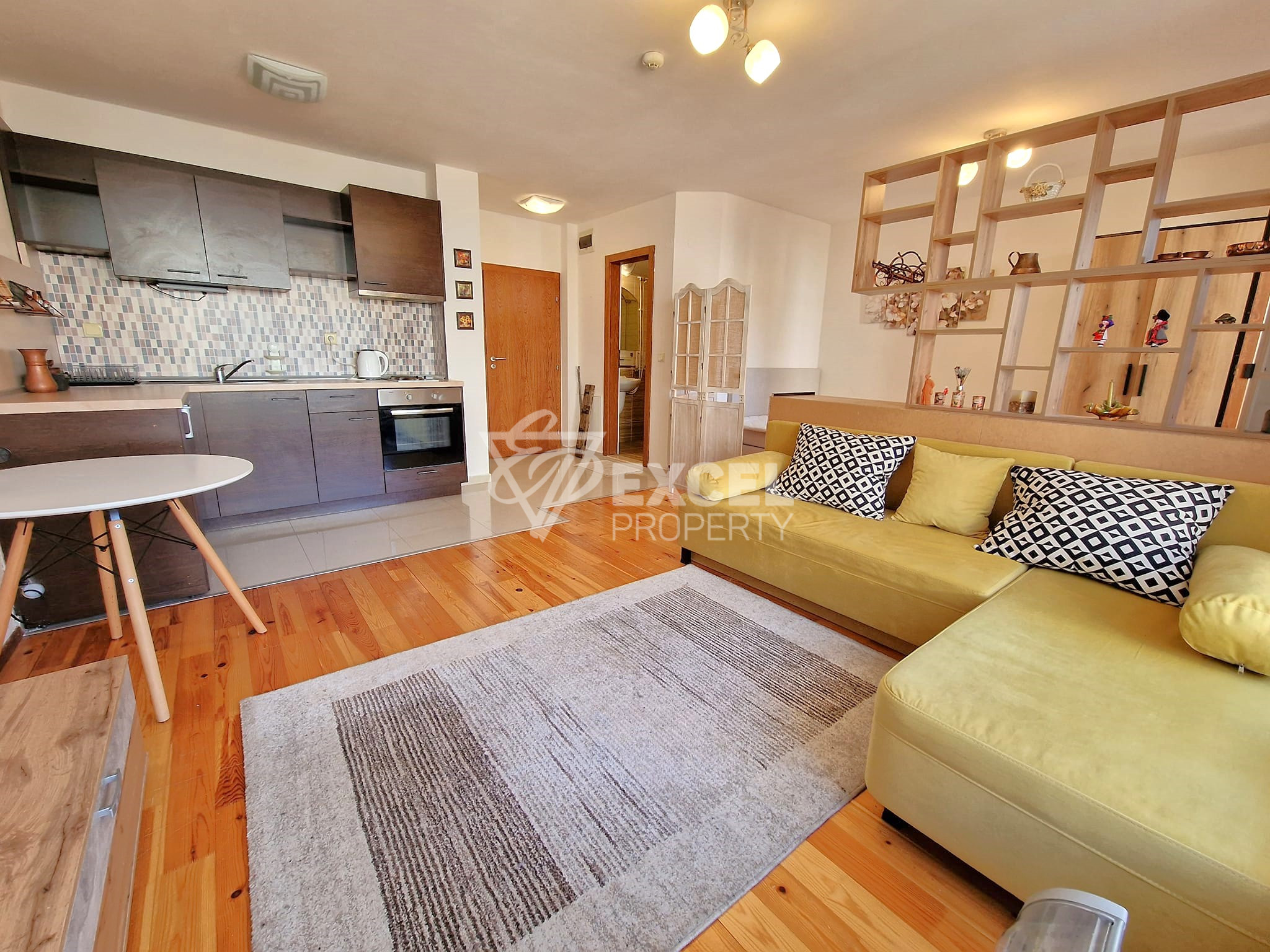 Изгодно студио с източна тераса в сграда с ниска такса поддръжка за продажба в Банско