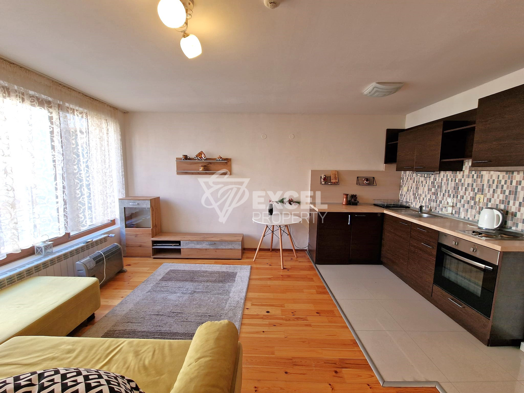 Изгодно студио с източна тераса в сграда с ниска такса поддръжка за продажба в Банско