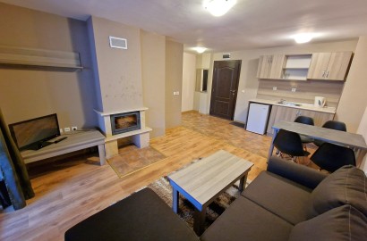 Двустаен апартамент с камина в целогодишно работещ комплекс за продажба в Банско