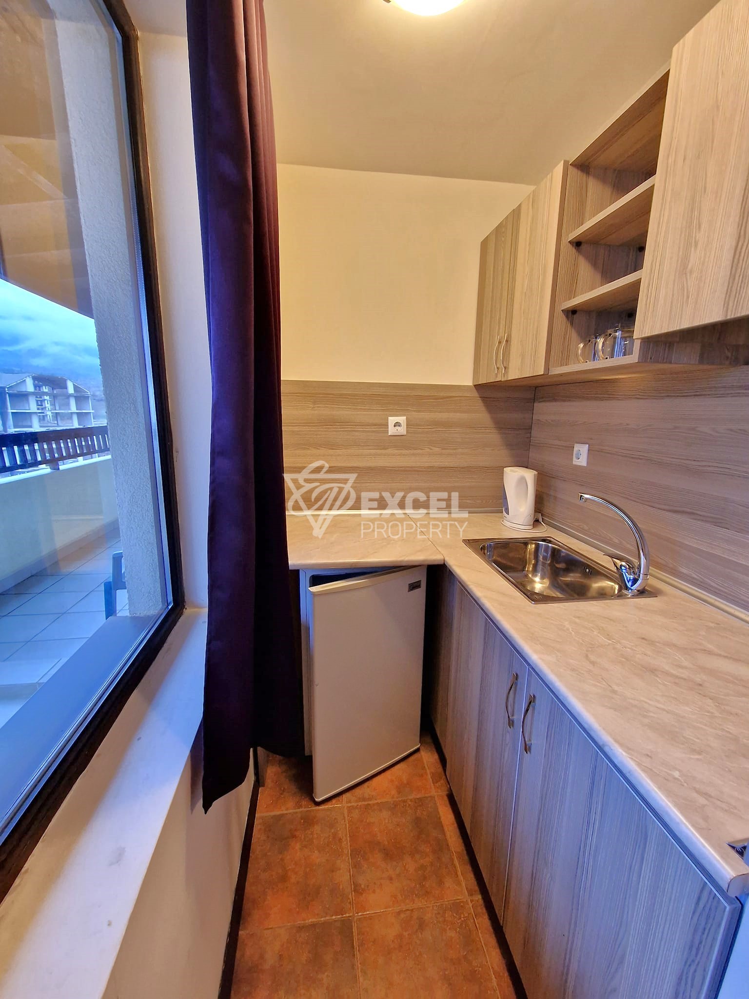 Маломерен двустаен апартамент с просторна тераса и фронтална гледка към Пирин за продажба в Банско