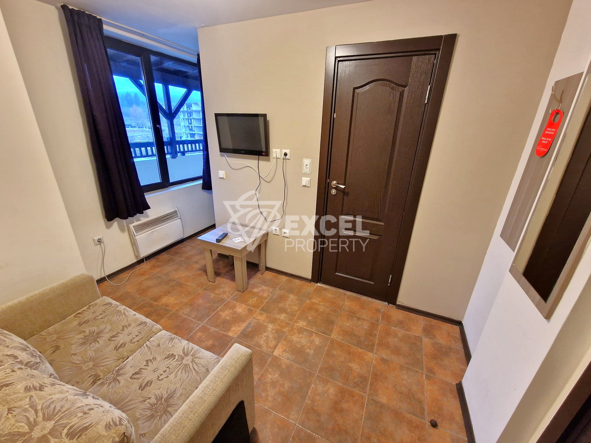 Маломерен двустаен апартамент с просторна тераса и фронтална гледка към Пирин за продажба в Банско