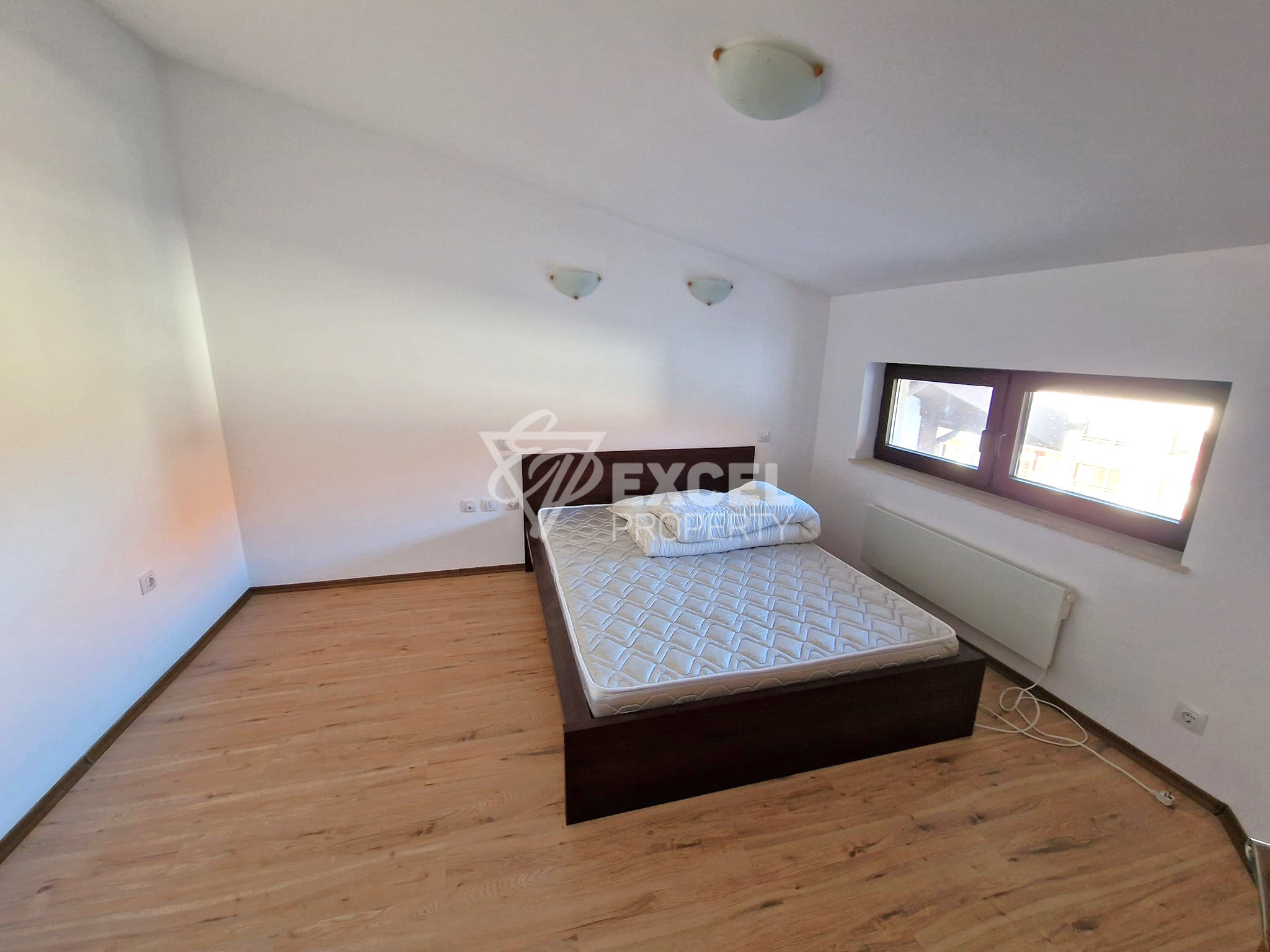 Двустаен апартамент с камина до Хотел Кемпински и Ресторант Виктория за продажба в Банско