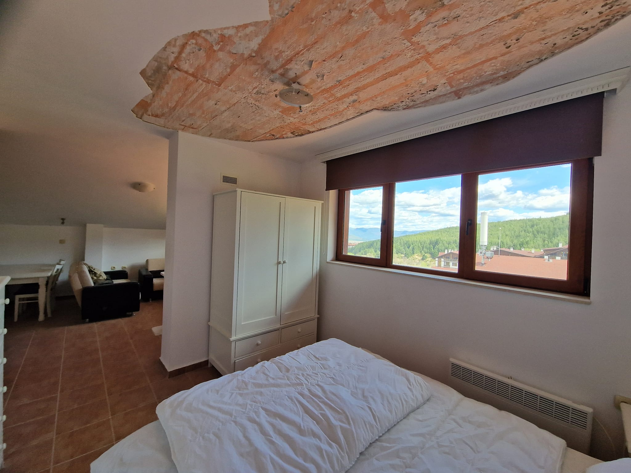 Източно студио с камина и ниска такса поддръжка за продажба в Банско