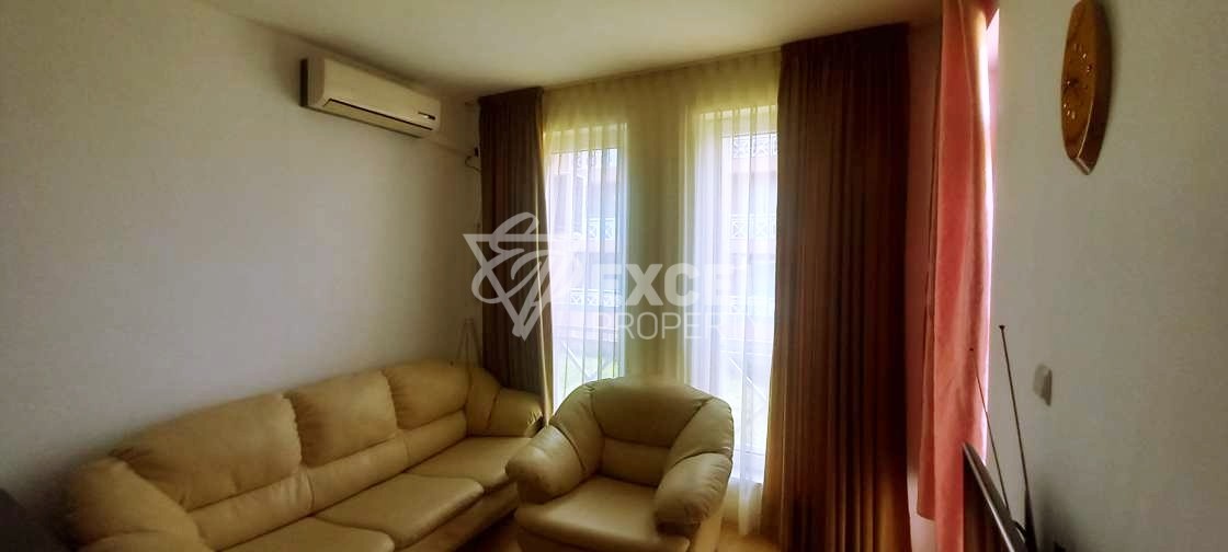 Двустаен обзаведен имот-в района на Слънчев бряг с платена такса поддръжка