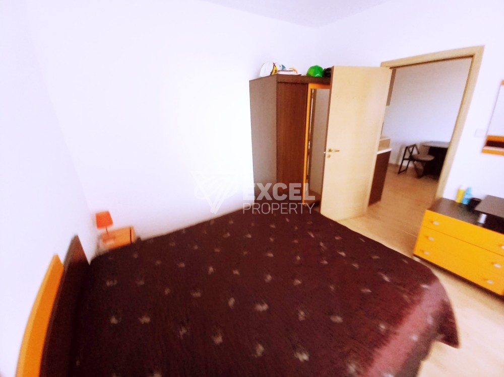 Двустаен обзаведен имот-в района на Слънчев бряг с платена такса поддръжка